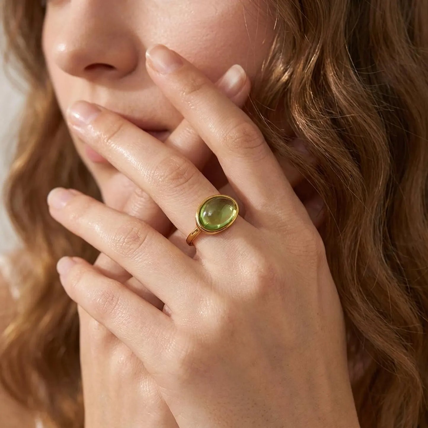 Peridot Oval Bezel Solitaire Ring